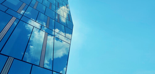 Office building. Glass skyscrapers in business center. Architecture, commercial real estate, sky © rohappy
