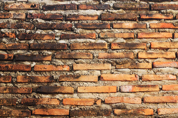 Naklejka premium Grungy brick wall texture background, mossy brick wall with cement plaster