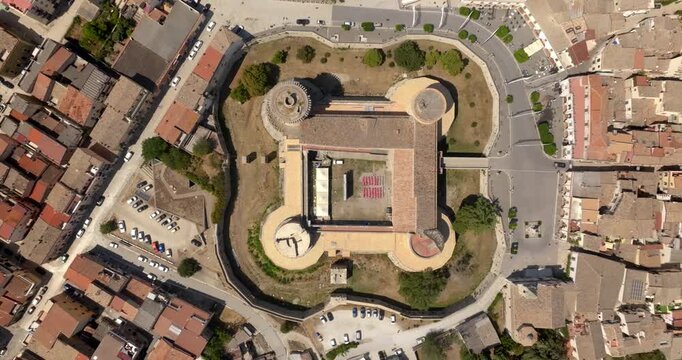 Aerial zenithal view on the Aragonese Castle of Venosa, a small town in province of Potenza, Basilicata, Italy. It's a a majestic medieval fortification with circular towers and stone fortifications.