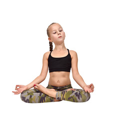 Little girl in camouflage leggings sitting in lotus yoga pose