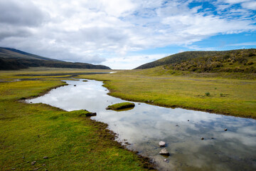 Fototapeta premium Scenic view of mountains and lake near Cotopaxi Volcano in Ecuador