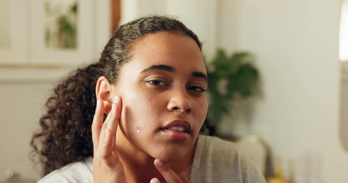 Face, woman and pimple patch in house with skincare, blemish control and hydrocolloid benefits. Person, apply zit sticker and cosmetic product in bathroom for acne treatment, breakout or dermatology.