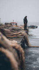Fototapeta premium Fishing net harbor fisherman winter dock boat cold rope quay