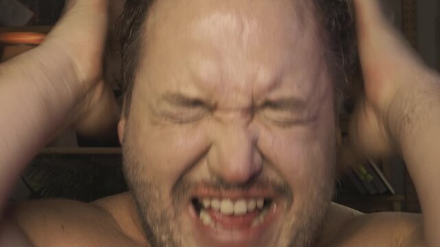 A man swears and argues with his interlocutor