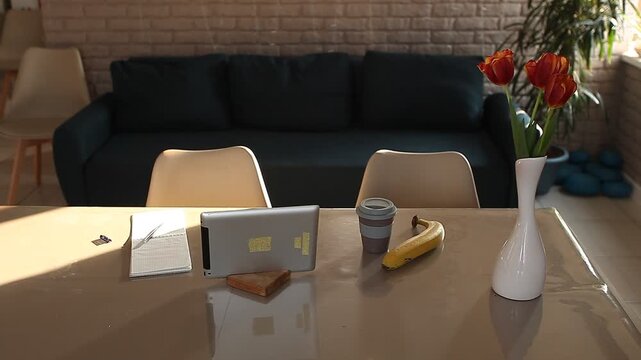 a laptop on the table in the room