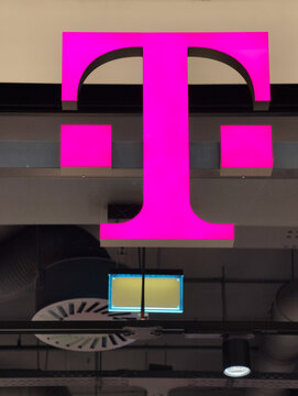 Prague, Czech Republic, March 12, 2026 &ndash; Exterior view of T-Mobile store signage and logo at a shopping mall. Editorial photography of a retail shop entrance in the commercial district during business