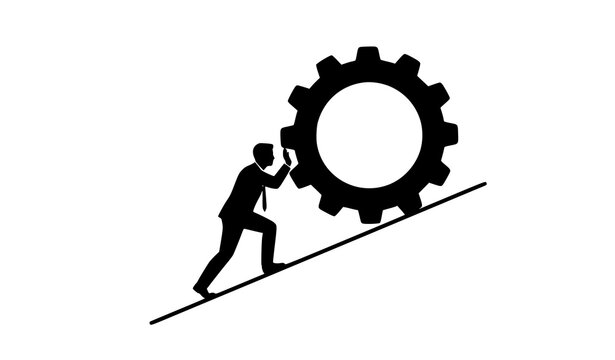 Businessman pushing gear up an incline symbolizing effort and overcoming challenges in business