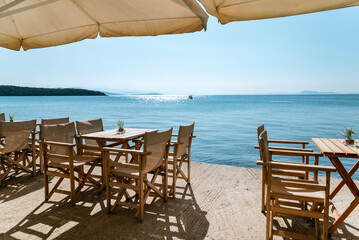 Fototapeta premium Traditional Greek Sea outdoor restaurant 
