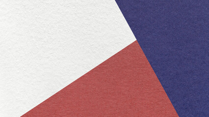Fototapeta premium Geometric triangular white, maroon, dark blue textured paper background with copy space for banner template