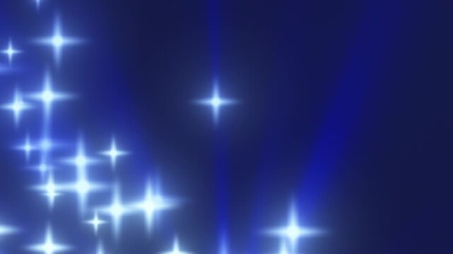 Abstract blue background with bright white starburst sparkles and soft glow
