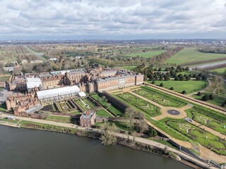 Fototapeta premium Aerial View of Hampton Court Palace and Beautiful Gardens, England