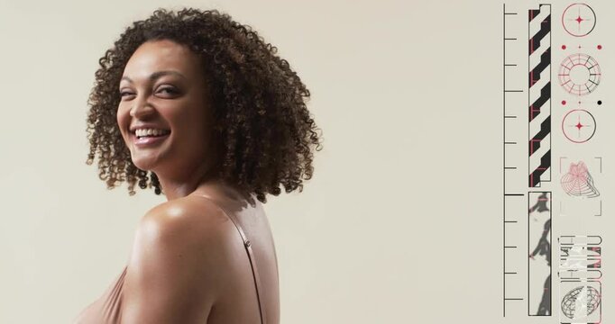 Female model on cue, pivoting and laughing for fashion while test strip aligning beside model