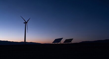 Obraz premium Wind Turbine Silhouette at Sunrise and Sunset Over Green Landscape