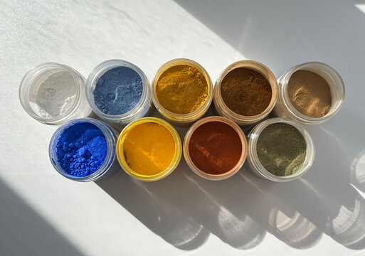 Natural pigments for painting. Ultramarine, lapis lazuli, ochre, red, cadmium, yellow, sienna, umber, white.