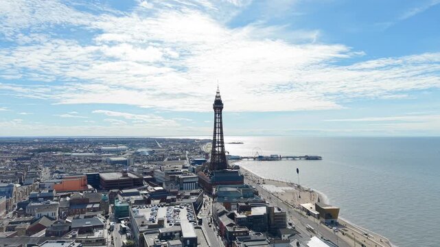 Aerial Drone footage of Blackpool Sea front, tower and the north sea on a beautiful sunny day