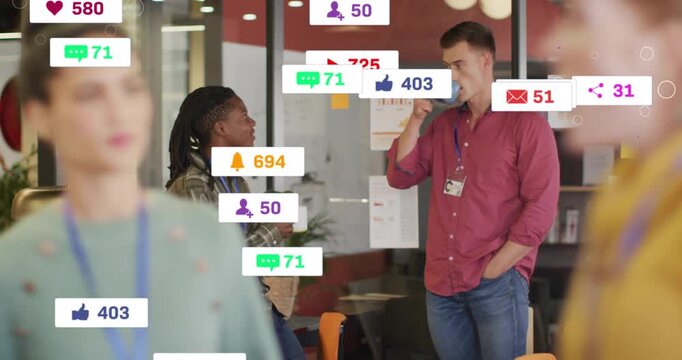 Two coworkers chatting on break, business app activity popping alert badges multiplying around mugs