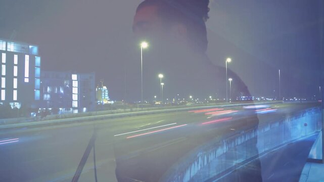 Male singer gripping mic singing starting road overlay shifting into shadow then returning to music