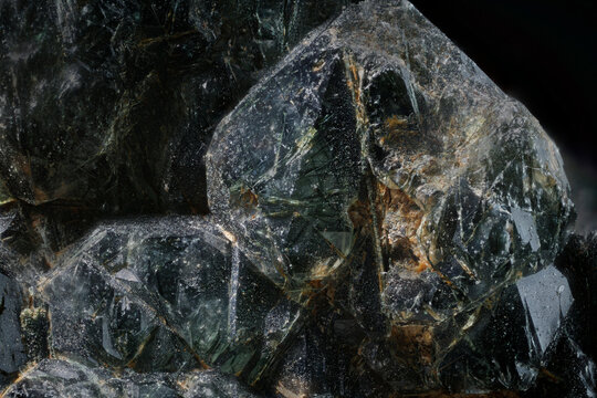 Macro prase green quartz crystals displaying rutile needle inclusions alongside transparent formations from Dalnegorsk, Russia, via microscope, 12x magnification, 3mm field view