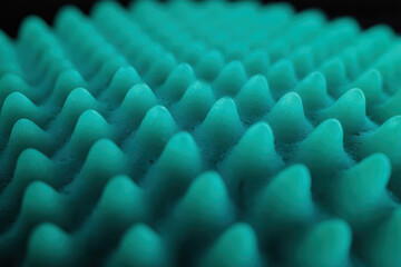 Obraz premium Close-up macro textured teal surface with conical protrusions