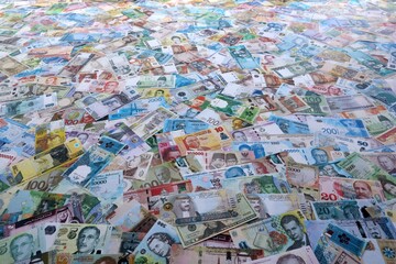 Money from different countries. Big amount of cash close up. Currency Exchange concept
