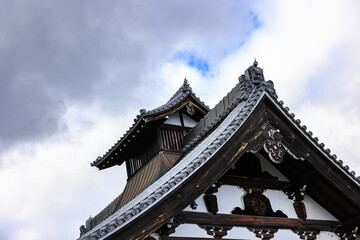 Fototapeta premium The fortress or rampart standing high in ancient castle of Japan.