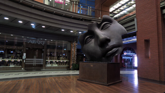 Poznań, Poland - January 6th 2019: Igor Mitoraj Installation at the Stary Browar shopping center.