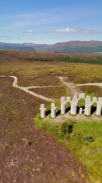 Breathtaking High Angle Drone Shot of Fyrish Monument Overlooking the Cromarty Firth at Alness, Scotland.