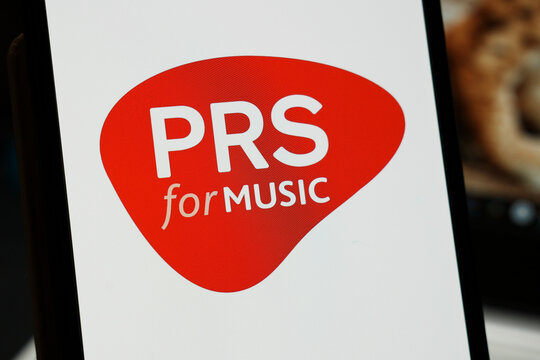 Warsaw, Poland - March 12, 2026: The PRS for MUSIC logo is prominently displayed, showcasing its brand identity in the music industry with a vibrant design against a clean background.