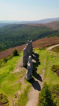 The Iconic Stone Arches of Fyrish Monument, A 18th Century Landmark on Fyrish Hill near Evanton, Scotland.