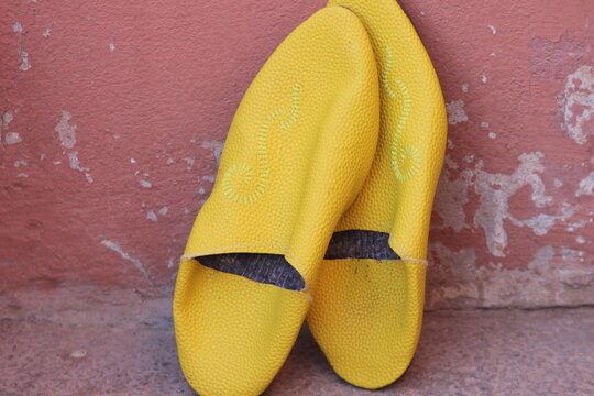 Yellow traditional Moroccan slippers known as babouche