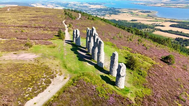 Famous Hiking Destination Fyrish Monument in Ross-shire, Scotland, Featuring Unique Arched Architecture.