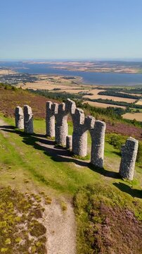Famous Hiking Destination Fyrish Monument in Ross-shire, Scotland, Featuring Unique Arched Architecture.
