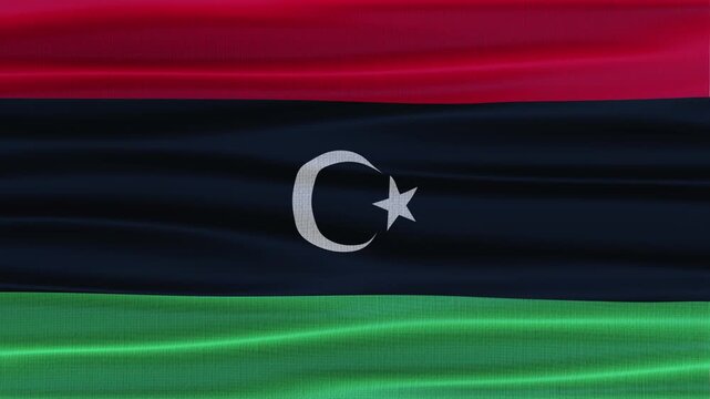 Libya flag waving in the wind with high quality fabric texture
