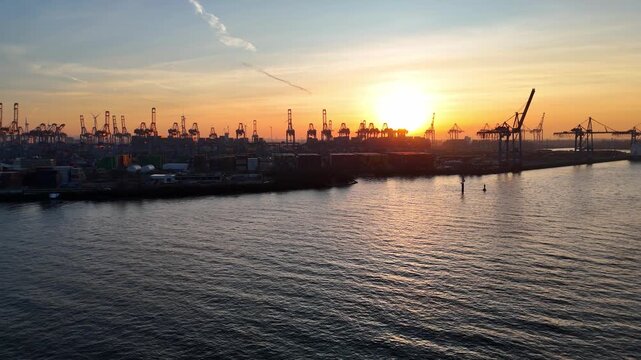 Hamburg Germany 2026 01 20: Aerial drone video of the Elbe River and harbor in Hamburg during lovely sunset