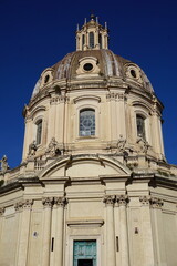 Obraz premium Vertical close up of the Renaissance architecture dome, cupola of the landmark Santa Maria di Loreto Catholic church in Rome, Italy