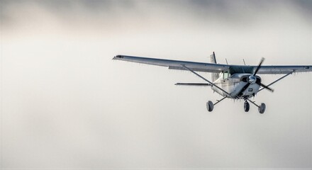 Small propeller airplane flying through heavy fog with frosted wings. Icing condition on aircraft during flight. Aviation safety risk and emergency landing concept in cold weather.