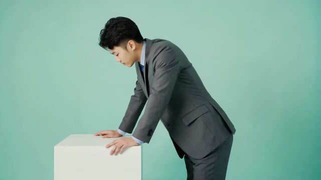 Upper body leans forward subtly The camera remains locked