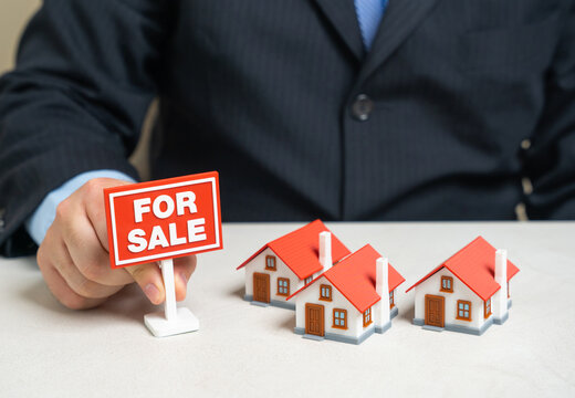 Houses are up for sale in modern neighborhoods. Residential complexes and gated communities attract buyers. Real estate development and housing investment in suburban living environments.