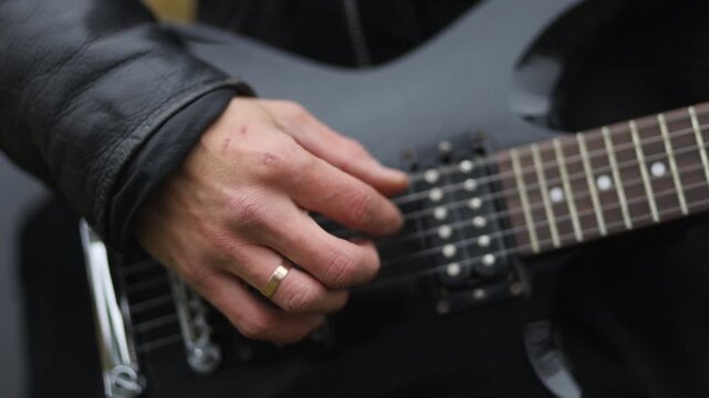 Close-up of playing an electric guitar