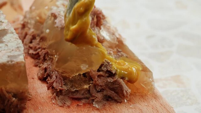 Meat aspic, slavic food, Traditional Russian pork meat aspic Kholodets with horseradish, mustard, jellied jelly beef, eating in restaurant chicken tasty dish. Close up on kitchen. 