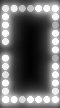 Bright white circular bulbs form a glowing rectangular frame on black background, ideal for stage, mirror or marquee design