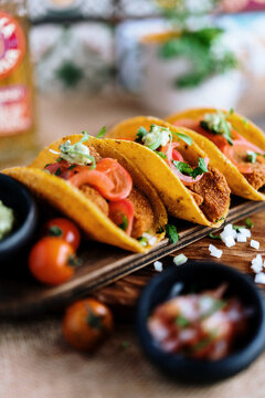 Tacos whit meal and vegetables and guacamole 