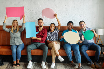 Portrait of a group of young business people in office. Speech bubble, team and comment by business...
