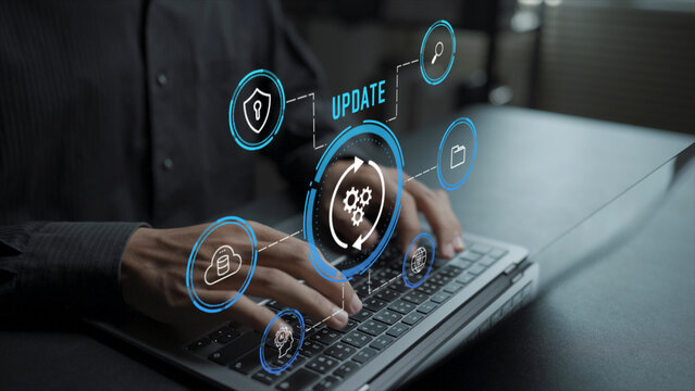 Software update concept. Person using laptop with system upgrade and application update icons, technology improvement, security patch and digital system maintenance.