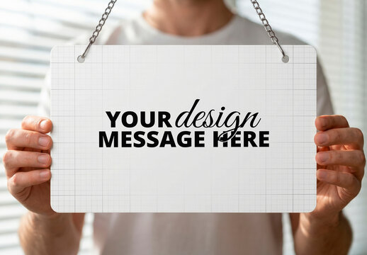 Man Holding Store Sign Mockup