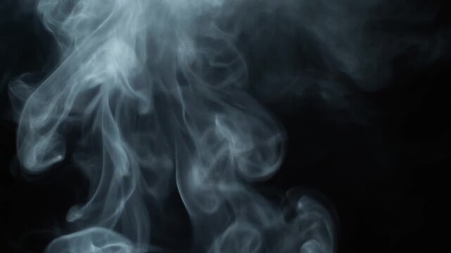 Gray smoke rising on black background abstract