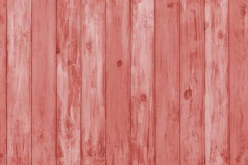 Red colored painted wooden board with visible grain and vertical planks, wall wooden surface. Rustic wood texture background, design element, wallpaper, backdrop