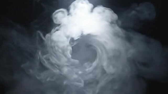 A mesmerizing video of white smoke swirling in the darkness, creating a dramatic and vibrant visual effect.
