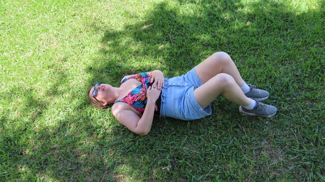 feet in grass