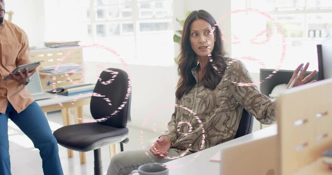 Woman leading office talk, raising hand to monitor causing pink circles scrolling then clearing